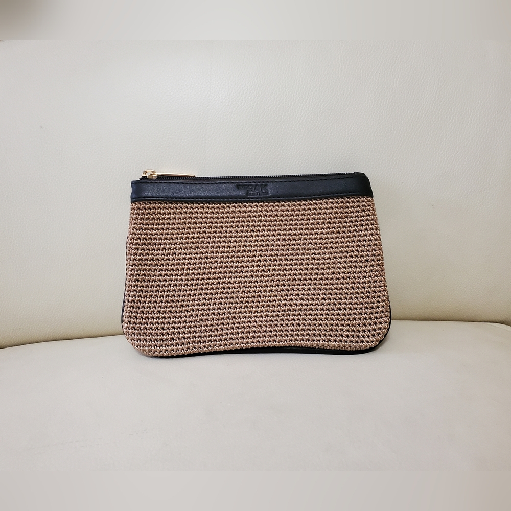 The Sak x Elliot Lucca pouch in brown with chocolate brown leather trim